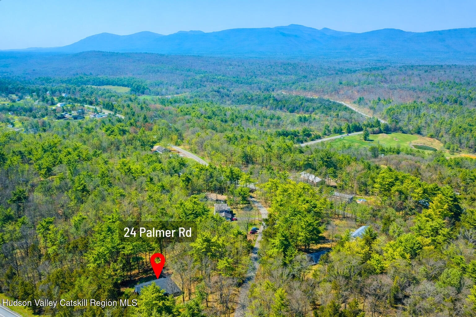 24 Palmer Road Catskill, NY 12414 - Photo 2 of 27 a view of a lush green field with a mountain in the background