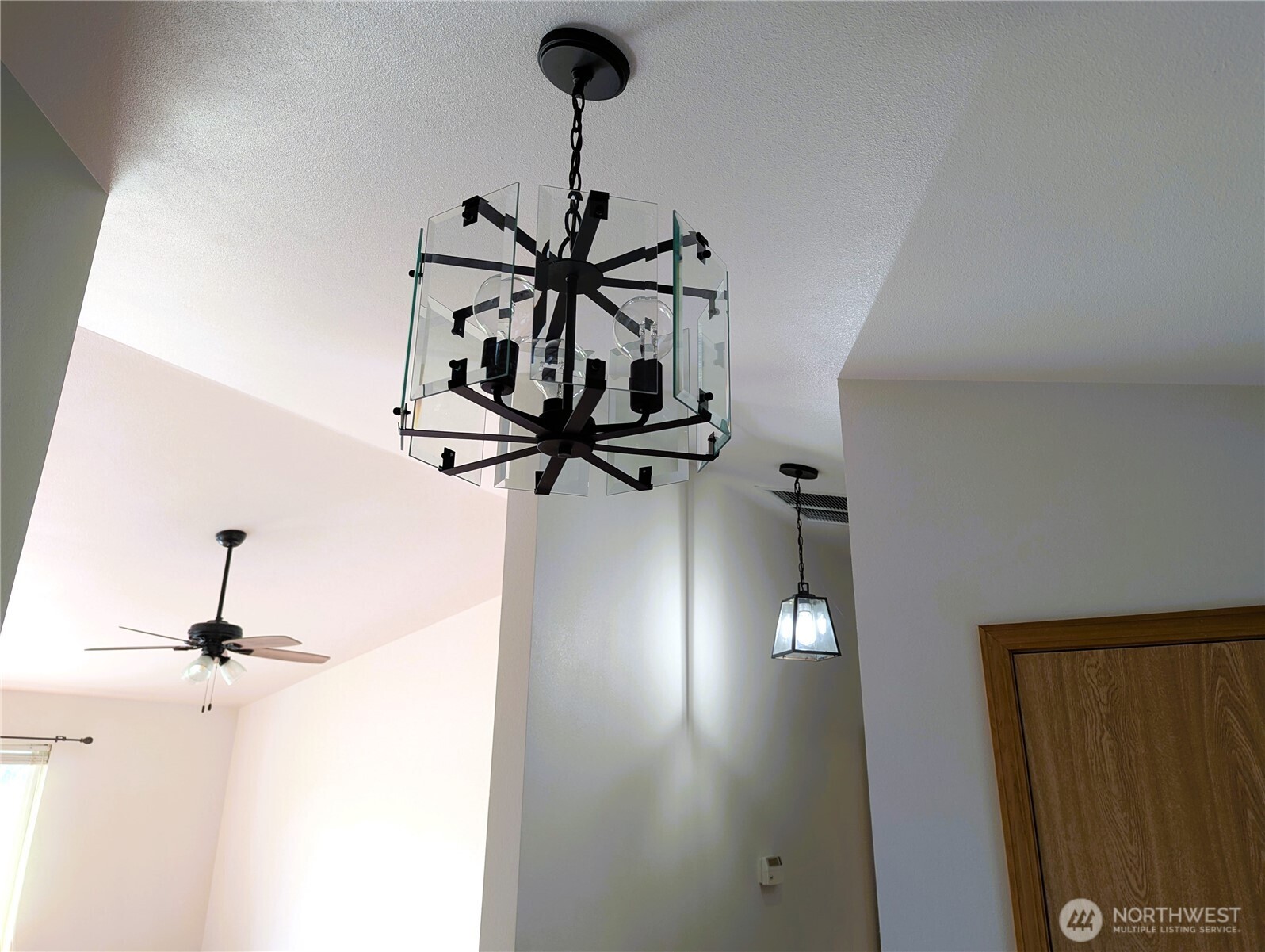 9441 180th Way Southwest Rochester, WA 98579 - Photo 7 of 37 a view of a room with a window and a ceiling fan