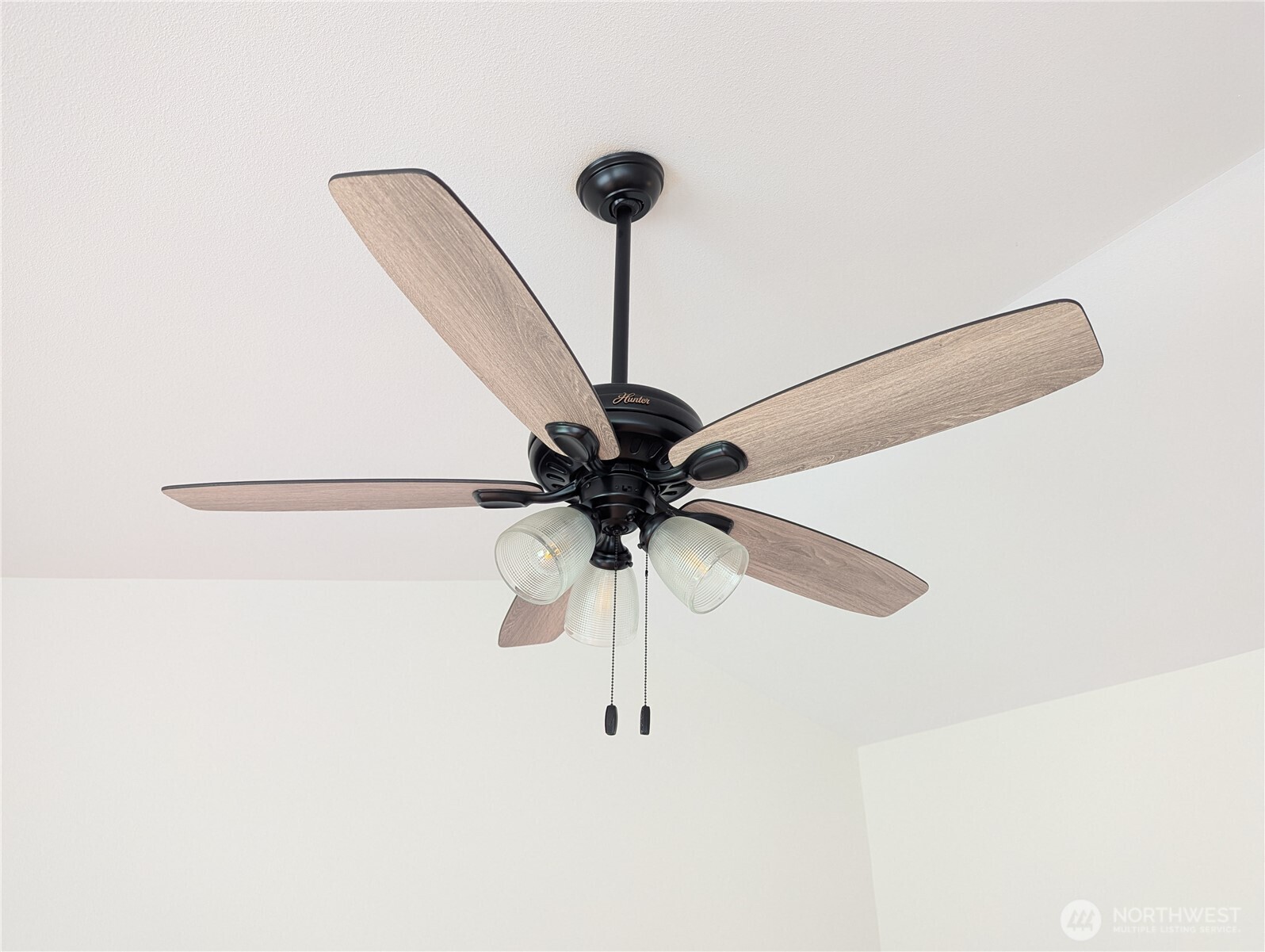 9441 180th Way Southwest Rochester, WA 98579 - Photo 9 of 37 a view of a room with a ceiling fan