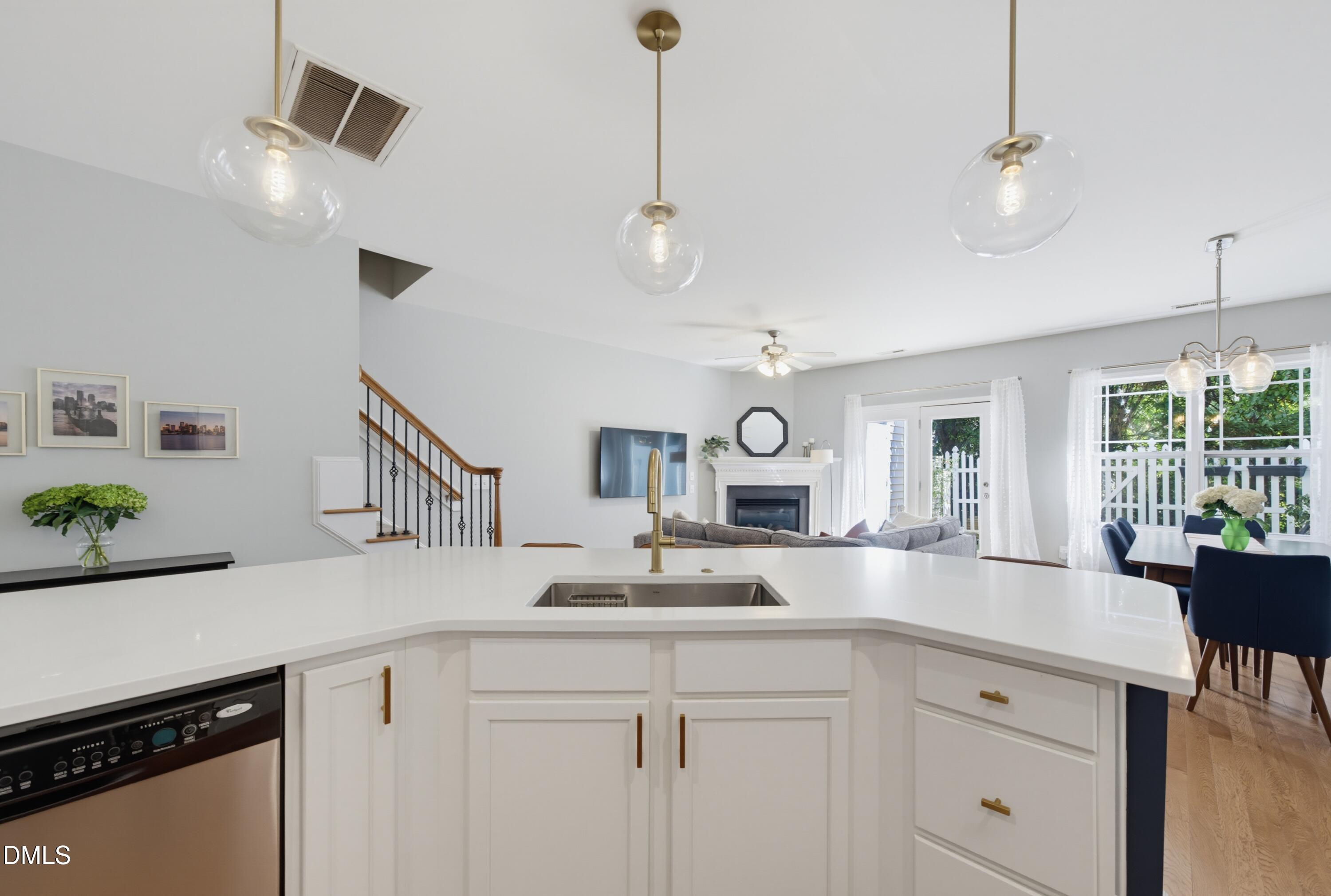 2543 Asher View Court Raleigh, NC 27606 - Photo 6 of 25 Updated Lighting and Pendants in Kitchen
