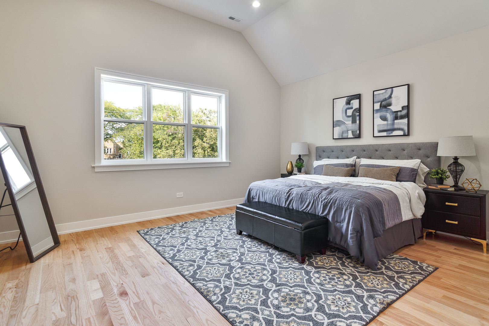 4602 North Springfield Avenue Chicago, IL 60625 - Photo 13 of 30 a bedroom with a large bed and a window