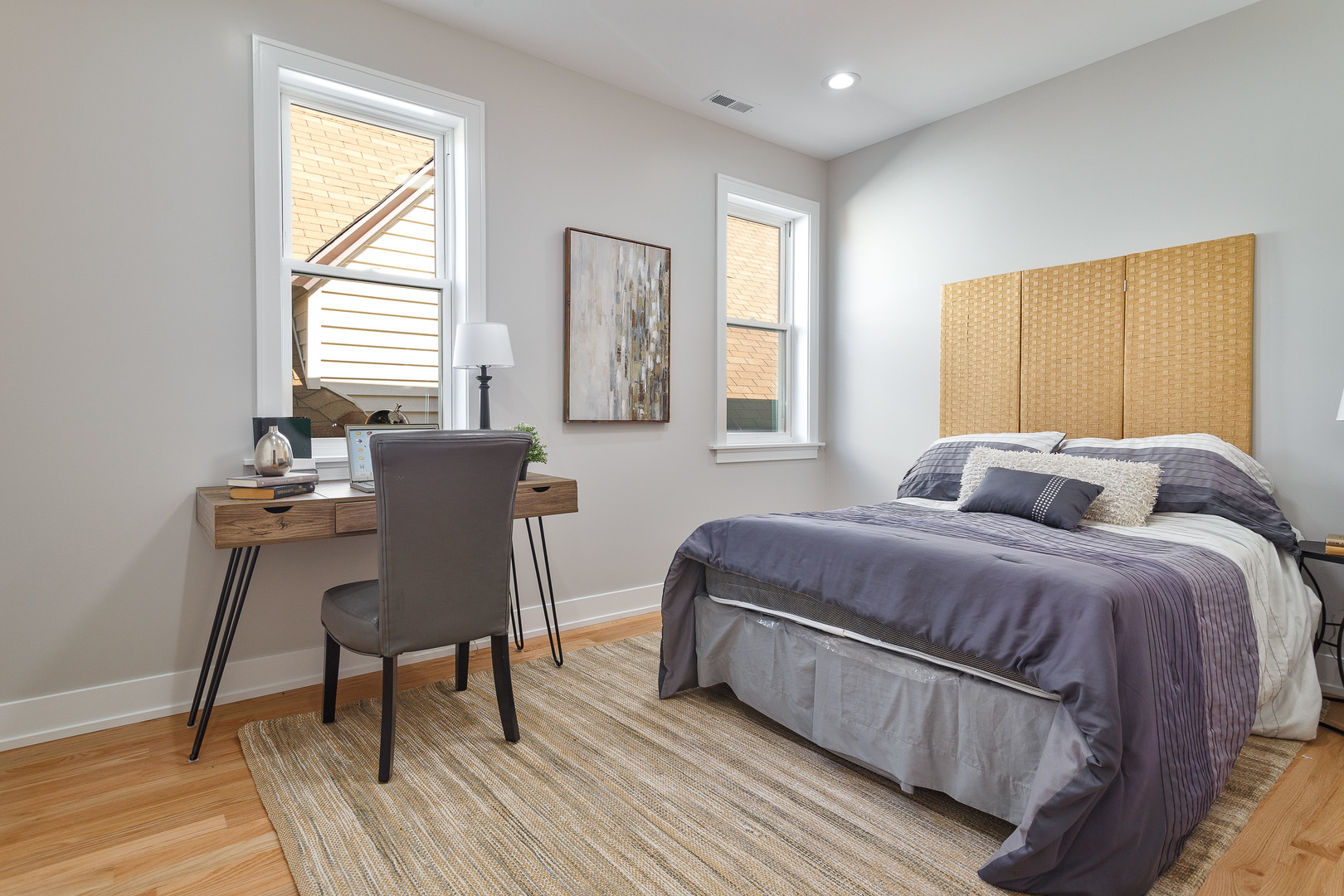 4602 North Springfield Avenue Chicago, IL 60625 - Photo 19 of 30 a bedroom with a bed and a table