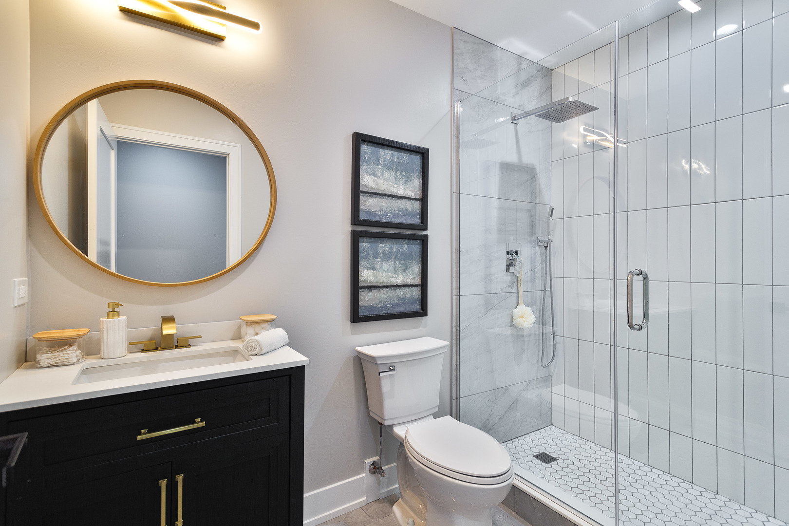 4602 North Springfield Avenue Chicago, IL 60625 - Photo 22 of 30 a bathroom with a toilet a sink and mirror