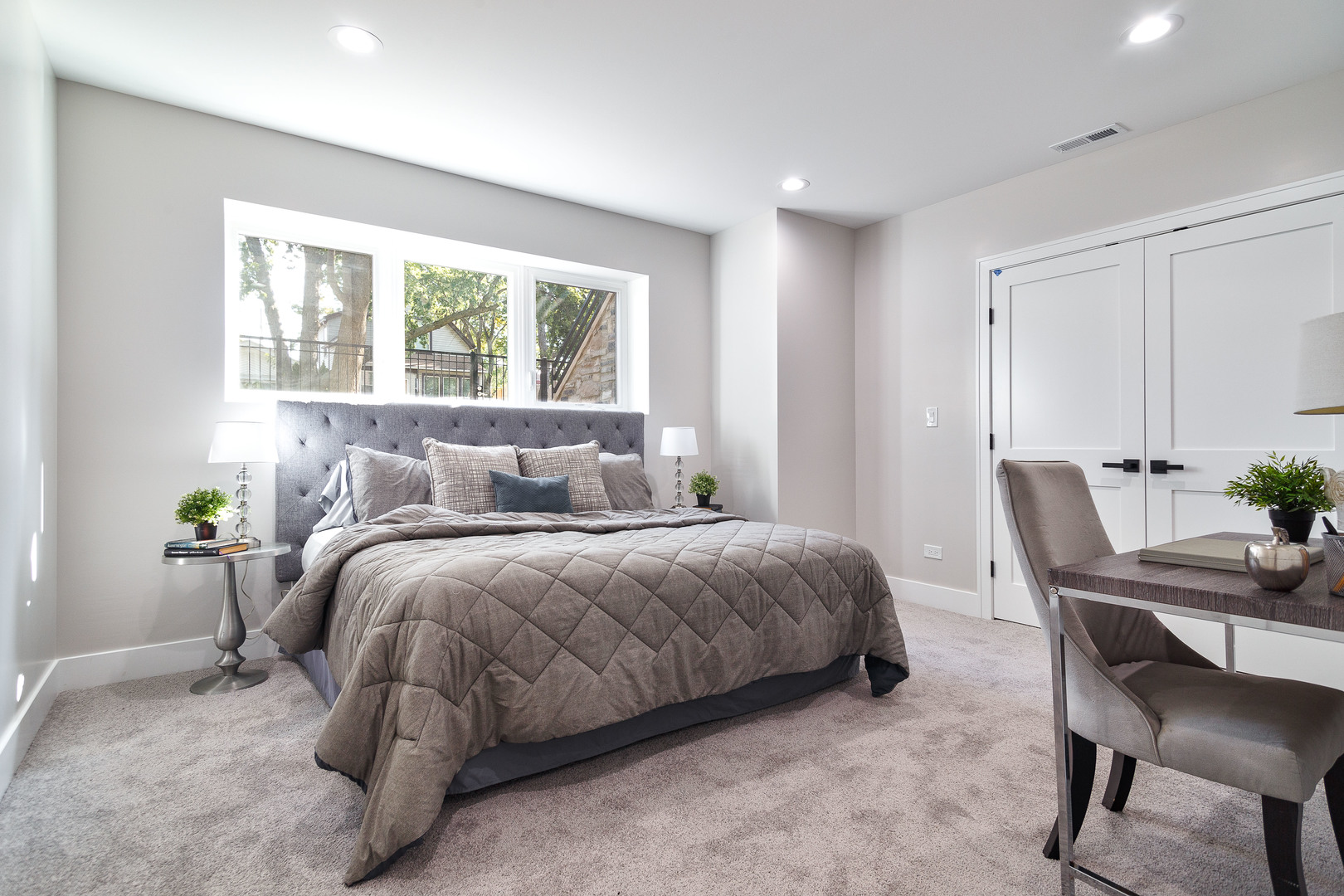 4602 North Springfield Avenue Chicago, IL 60625 - Photo 23 of 30 a bedroom with a bed a desk and chair