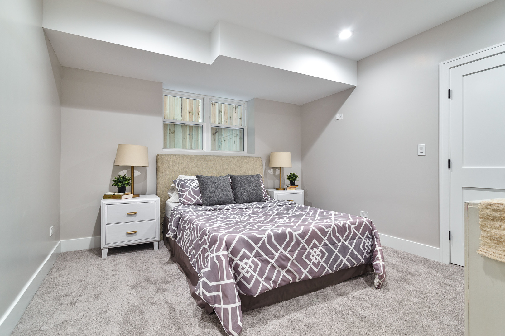 4602 North Springfield Avenue Chicago, IL 60625 - Photo 24 of 30 a bedroom with a bed and a couch