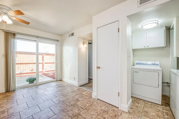 a room with a washer and dryer