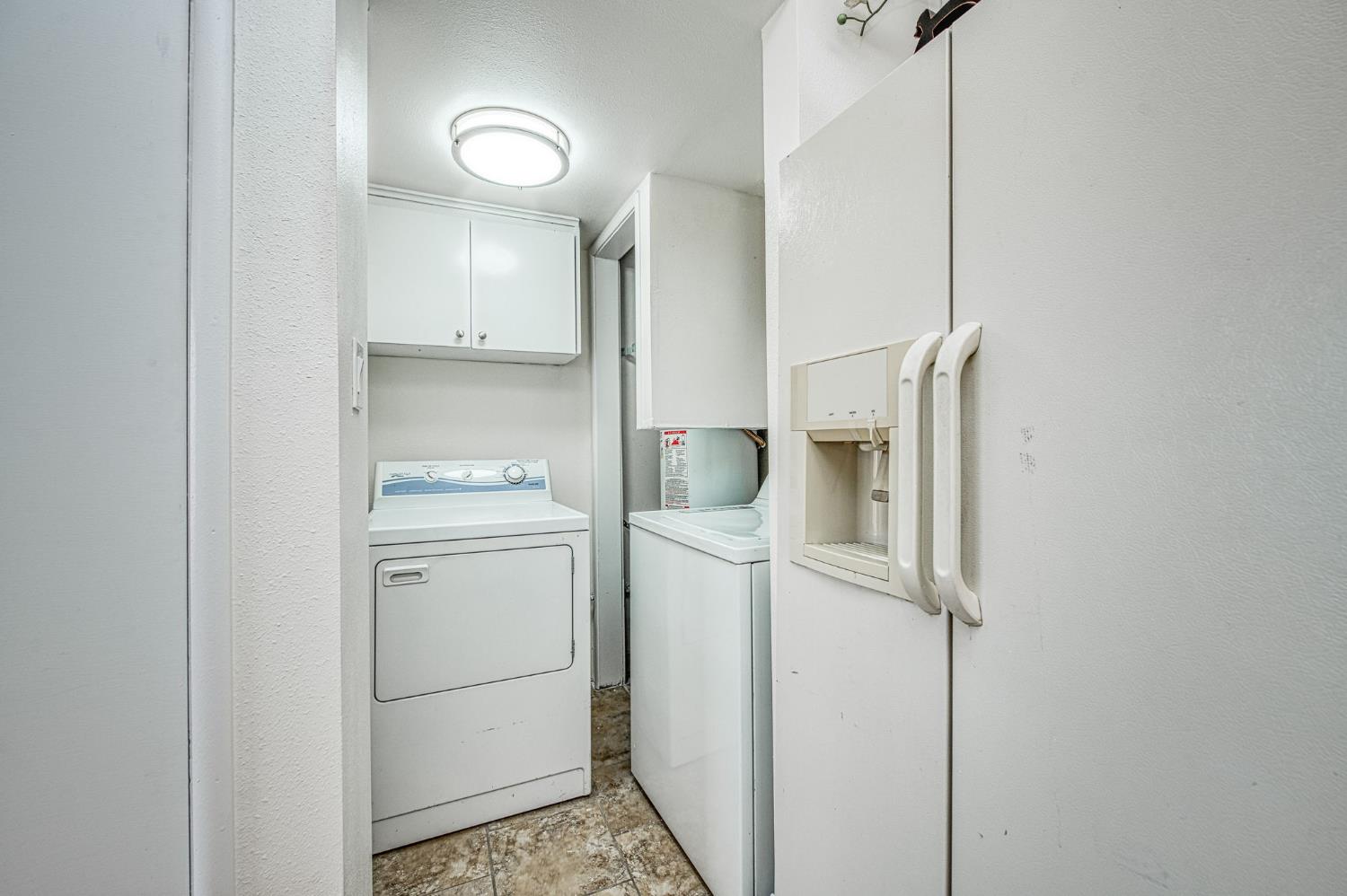6656 North 3rd Street Fresno, CA 93710 - Photo 16 of 31 a room with a washer and dryer
