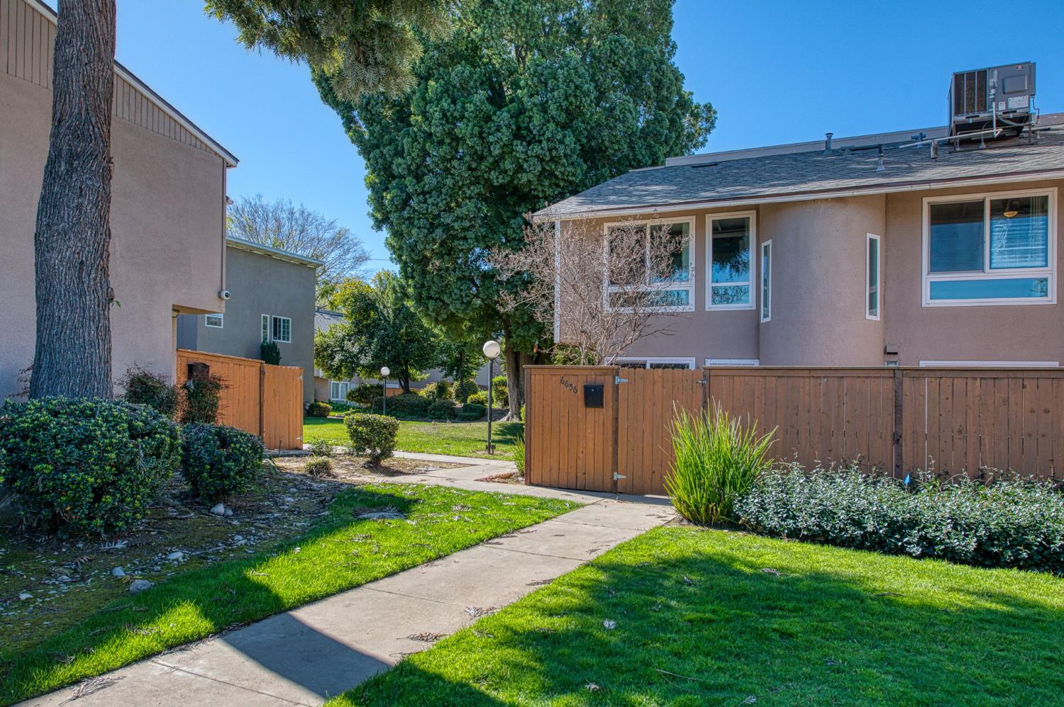 6656 North 3rd Street Fresno, CA 93710 - Photo 26 of 31 a view of a house with backyard and garden