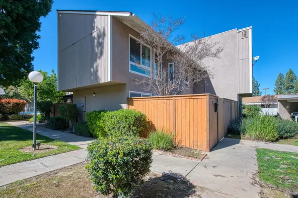 a view of a back yard of the house