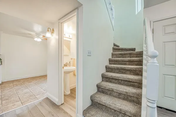 a bathroom with a toilet and a sink