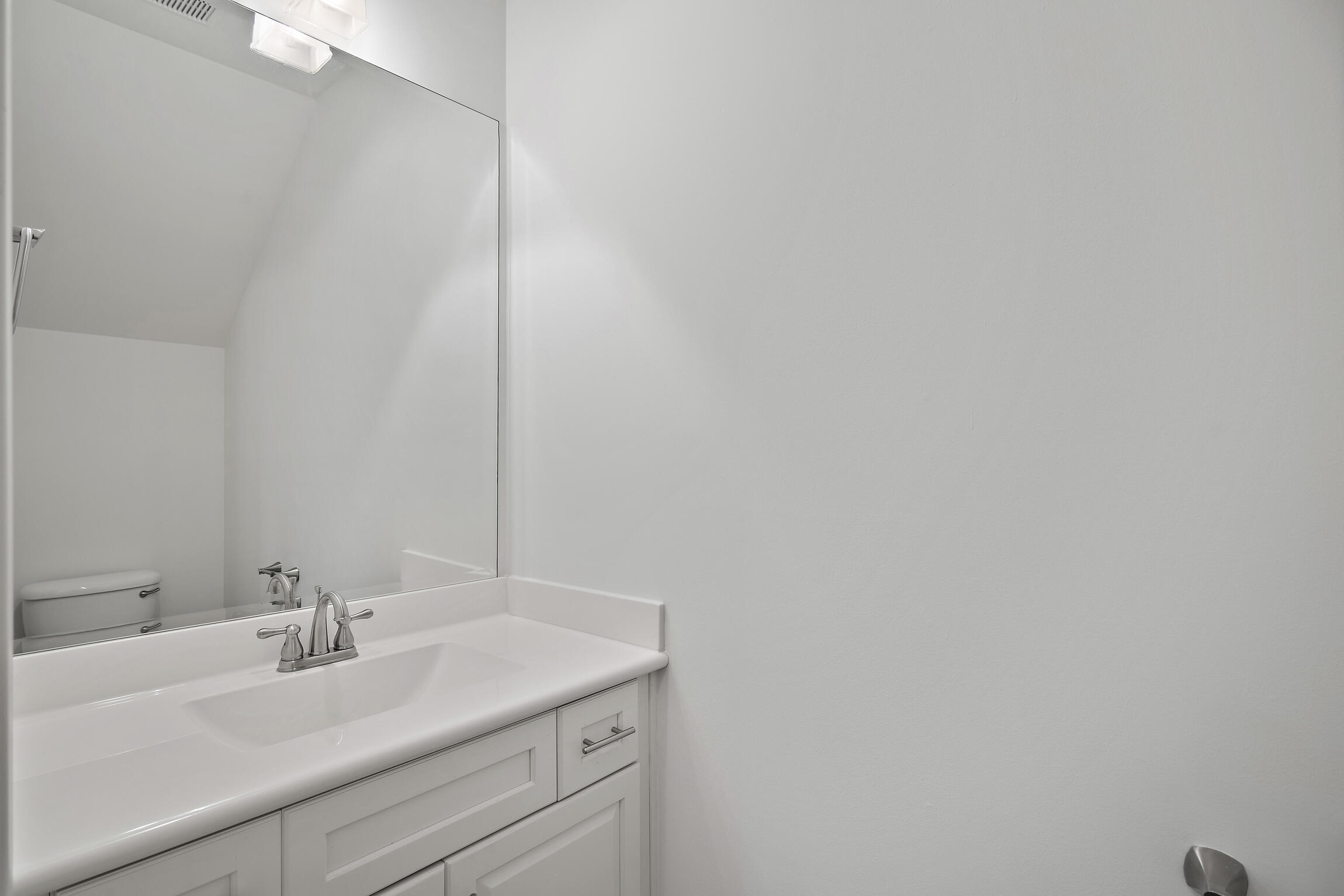 193 Christian Drive Santa Rosa Beach, FL 32459 - Photo 14 of 41 a bathroom with a sink and a mirror