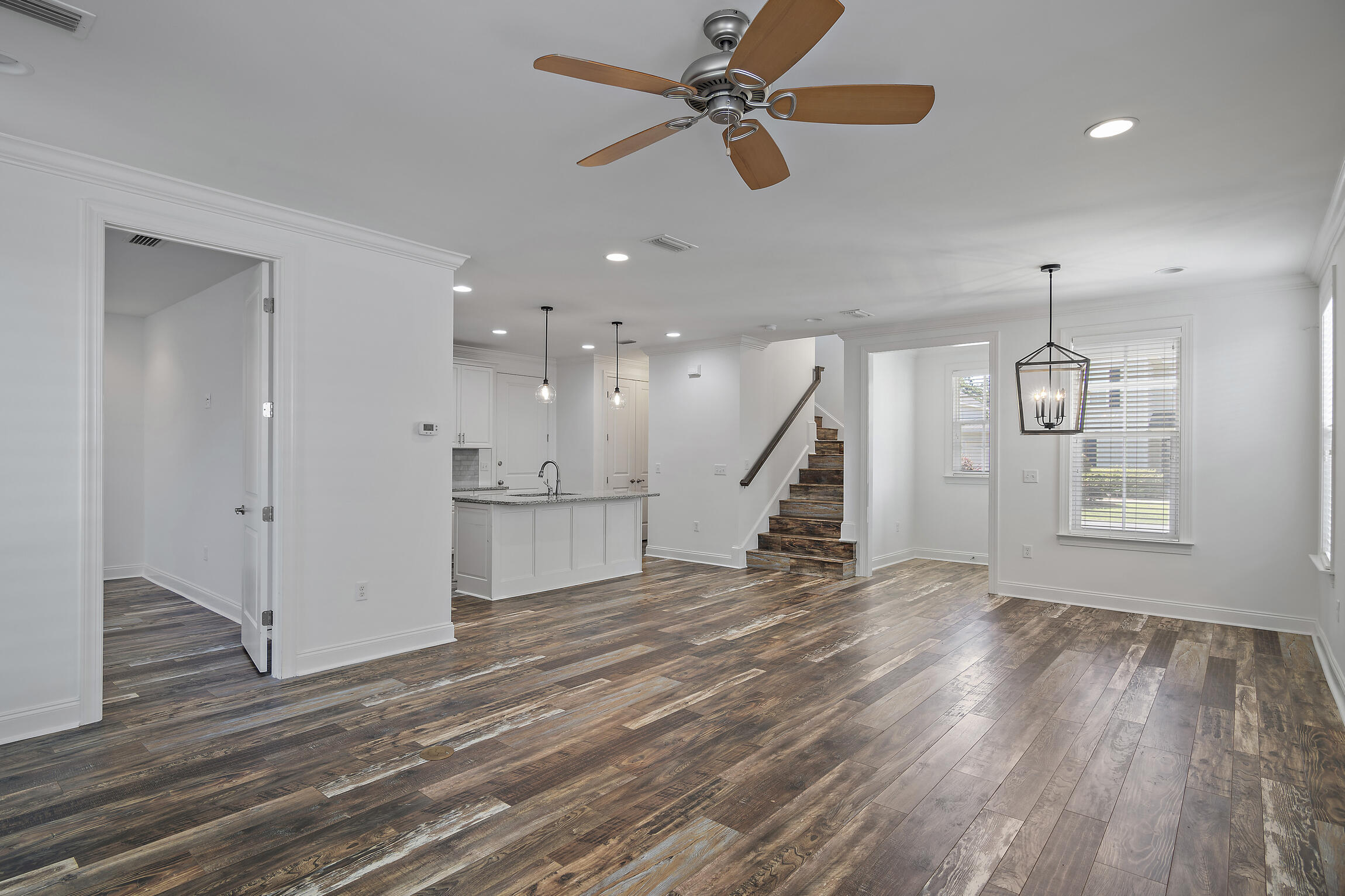 193 Christian Drive Santa Rosa Beach, FL 32459 - Photo 16 of 41 a view of empty room with wooden floor and fan