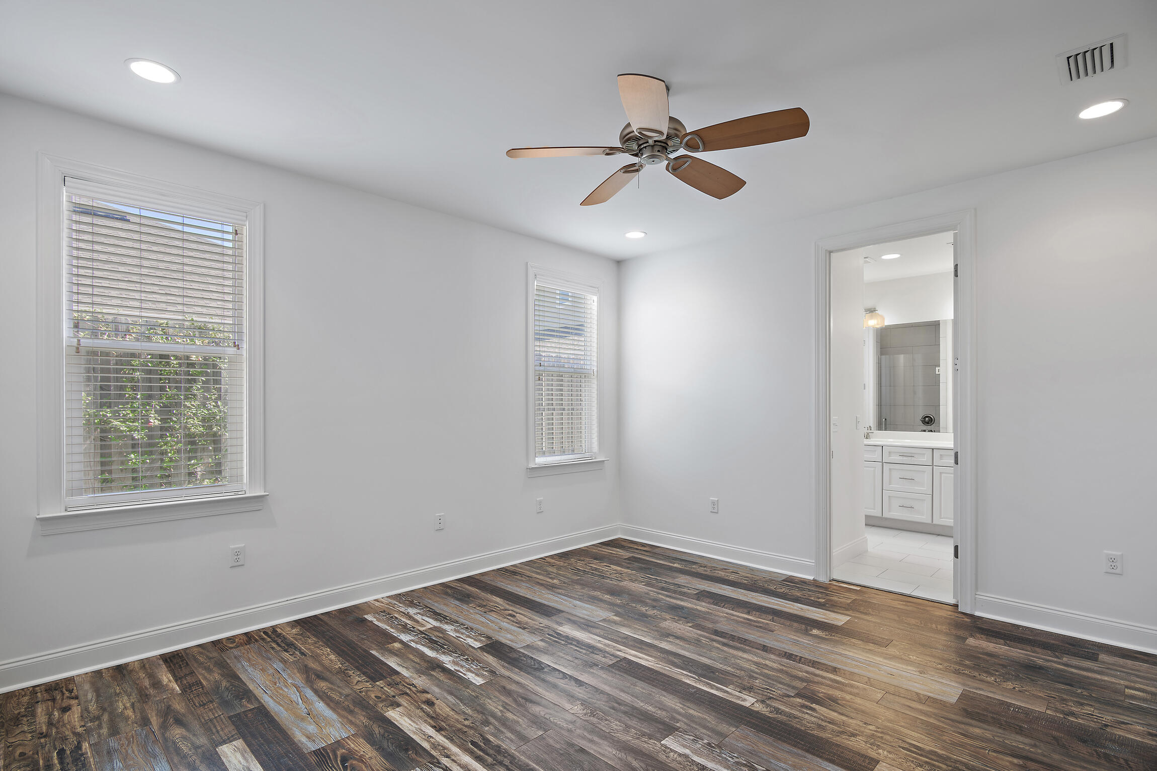 193 Christian Drive Santa Rosa Beach, FL 32459 - Photo 18 of 41 a view of empty room with wooden floor and fan
