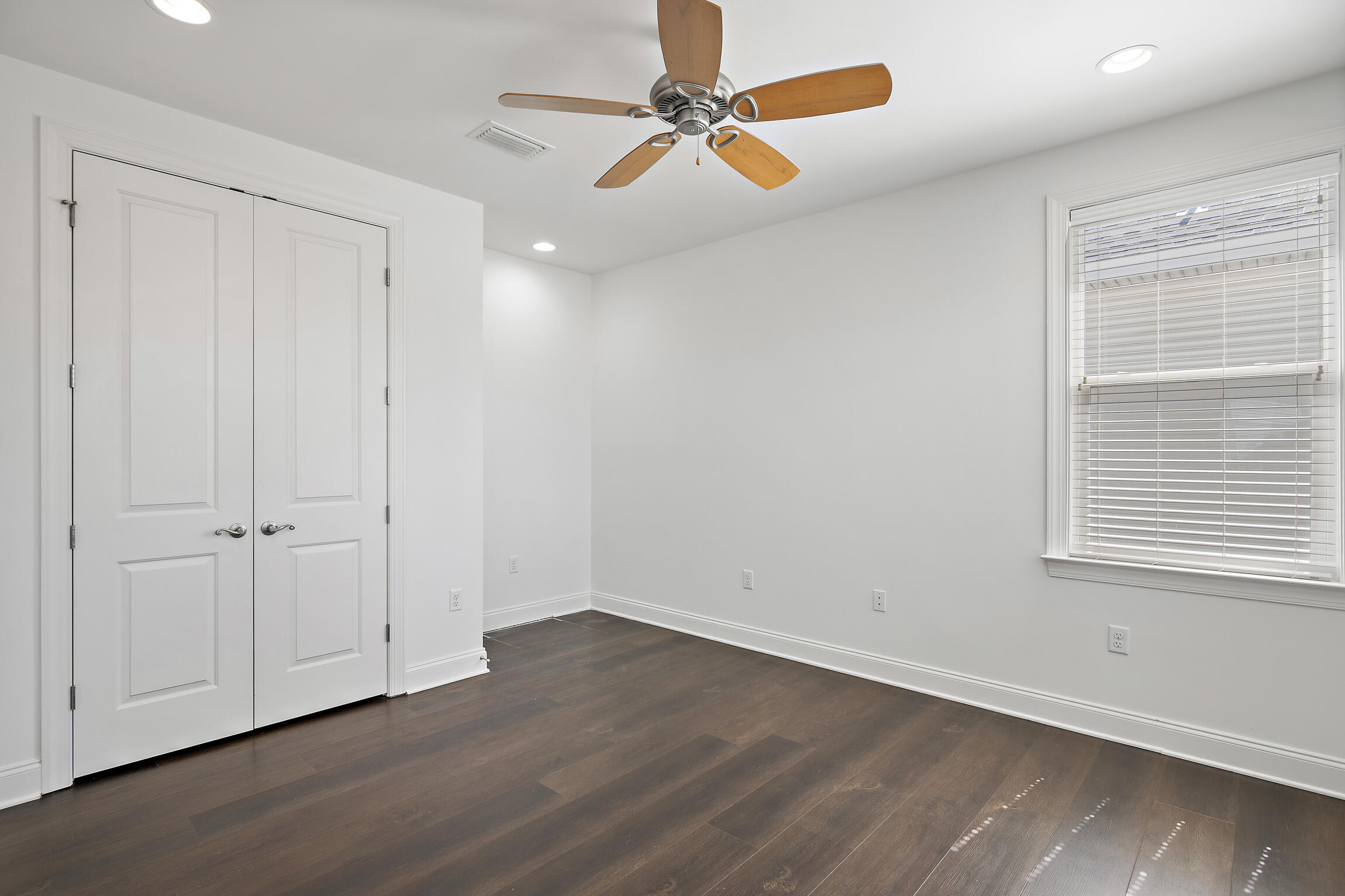 193 Christian Drive Santa Rosa Beach, FL 32459 - Photo 26 of 41 wooden floor in an empty room with a window