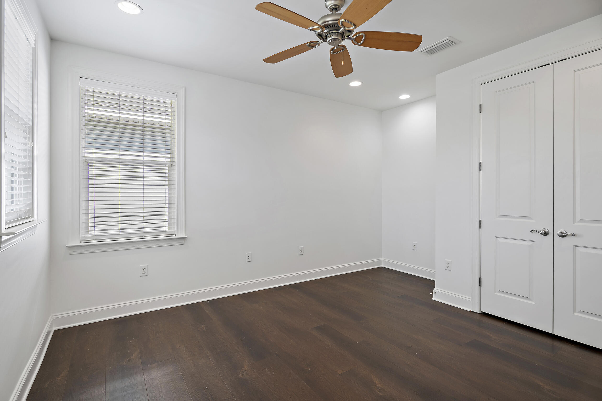 193 Christian Drive Santa Rosa Beach, FL 32459 - Photo 28 of 41 an empty room with wooden floor closet and windows