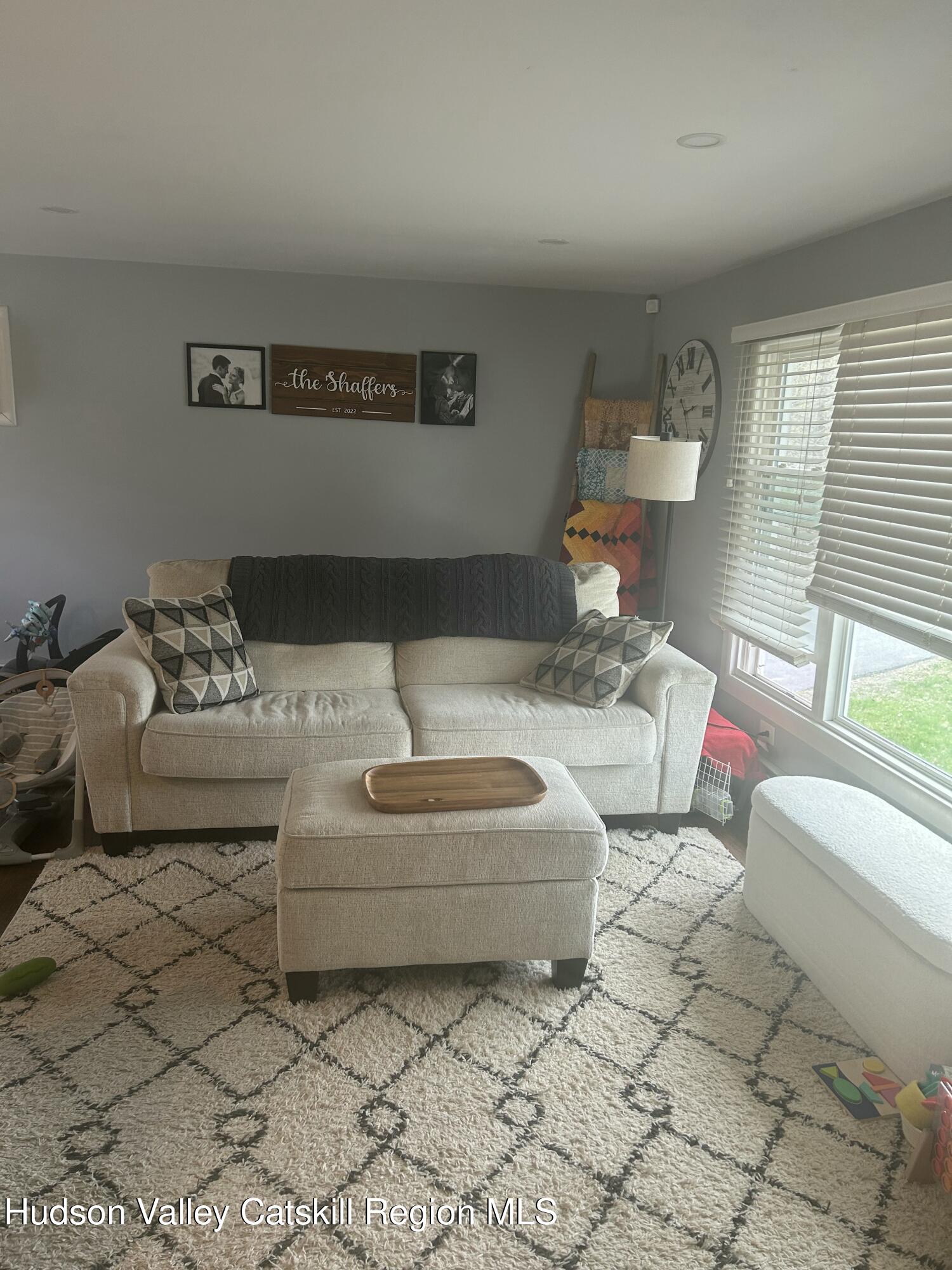 22 Caywood Road Poughkeepsie, NY 12603 - Photo 4 of 27 a living room with furniture and a couch
