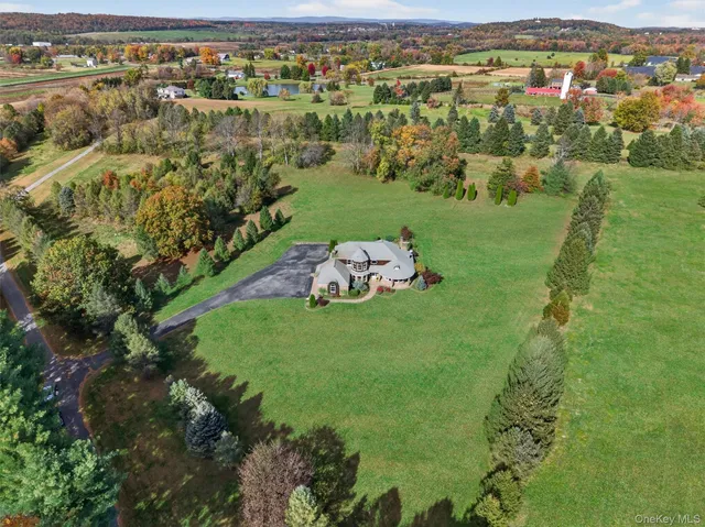 a view of a lake with a big yard