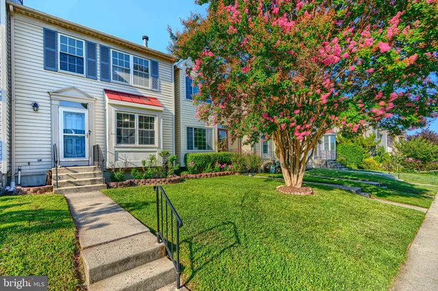 a front view of house with yard