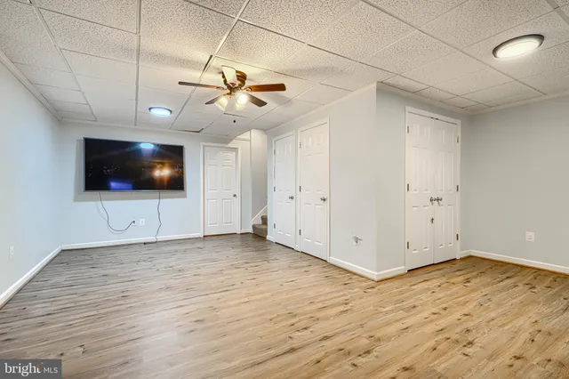 a view of a livingroom with wooden floor