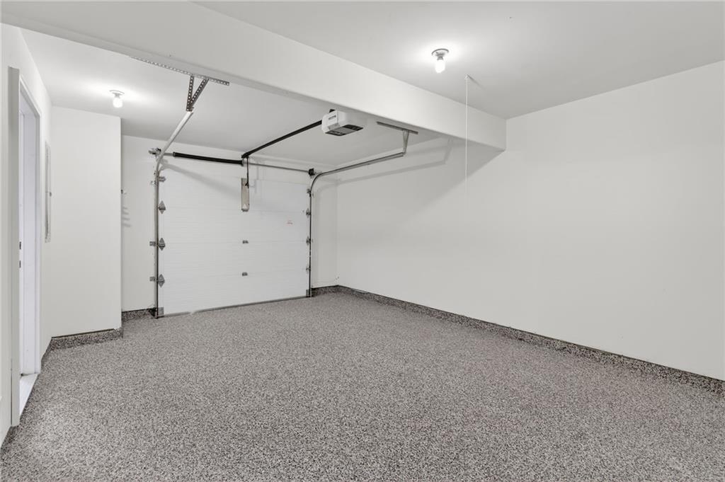 1186 Lake Point Way Suwanee, GA 30024 - Photo 30 of 35 a view of a garage
