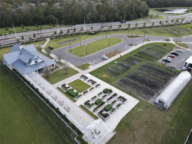 a view of a swimming pool with a lounge chairs