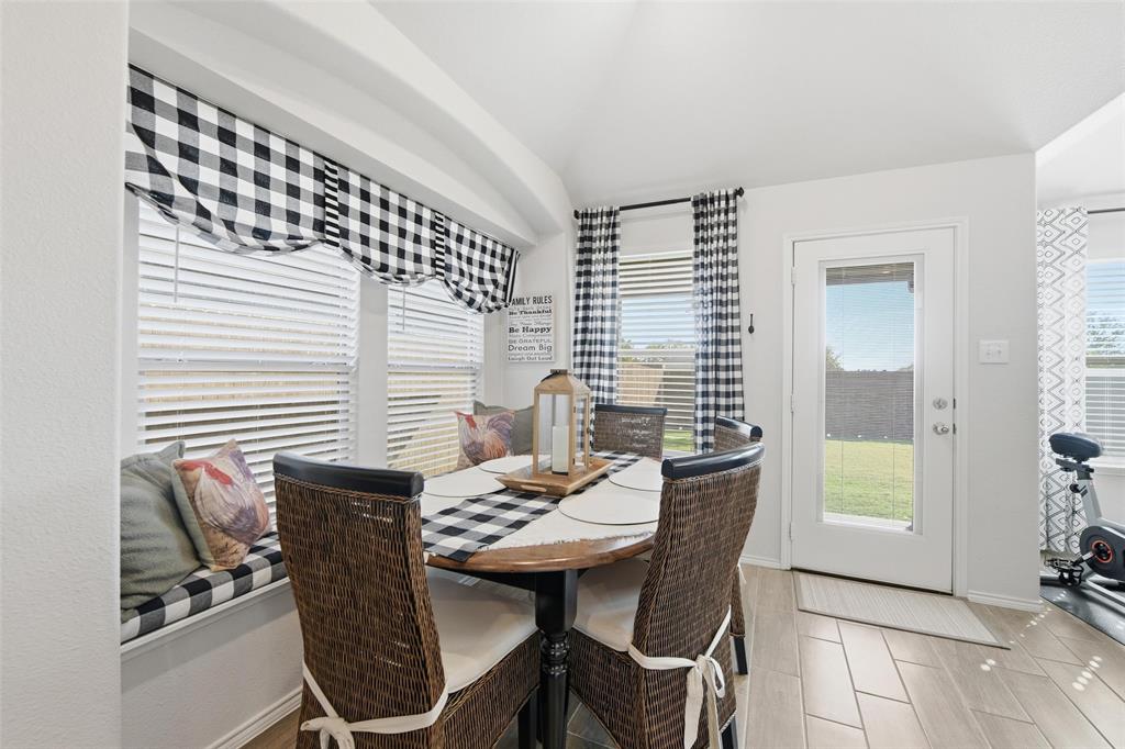 725 Sandy Chip Trail Fort Worth, TX 76108 - Photo 11 of 30 a view of a dining room with furniture and window