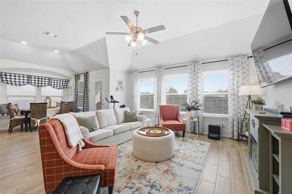 725 Sandy Chip Trail Fort Worth, TX 76108 - Photo 15 of 30 a living room with furniture kitchen view and a large window