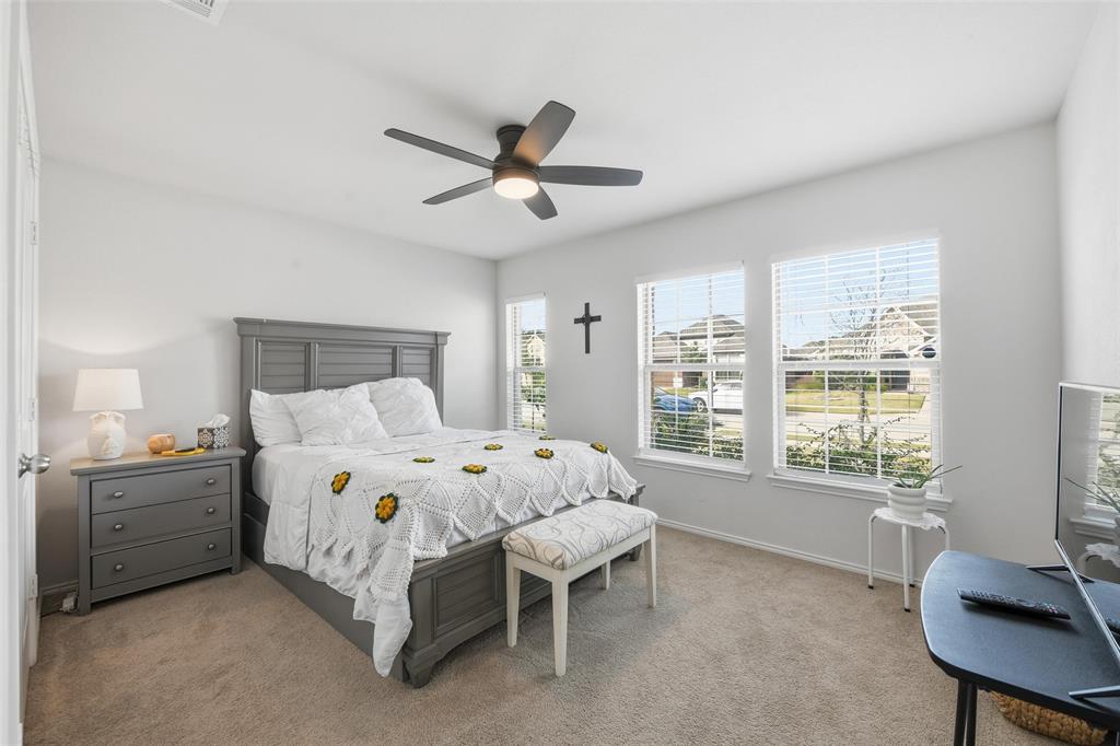 725 Sandy Chip Trail Fort Worth, TX 76108 - Photo 4 of 30 a bed room with a bed and a window