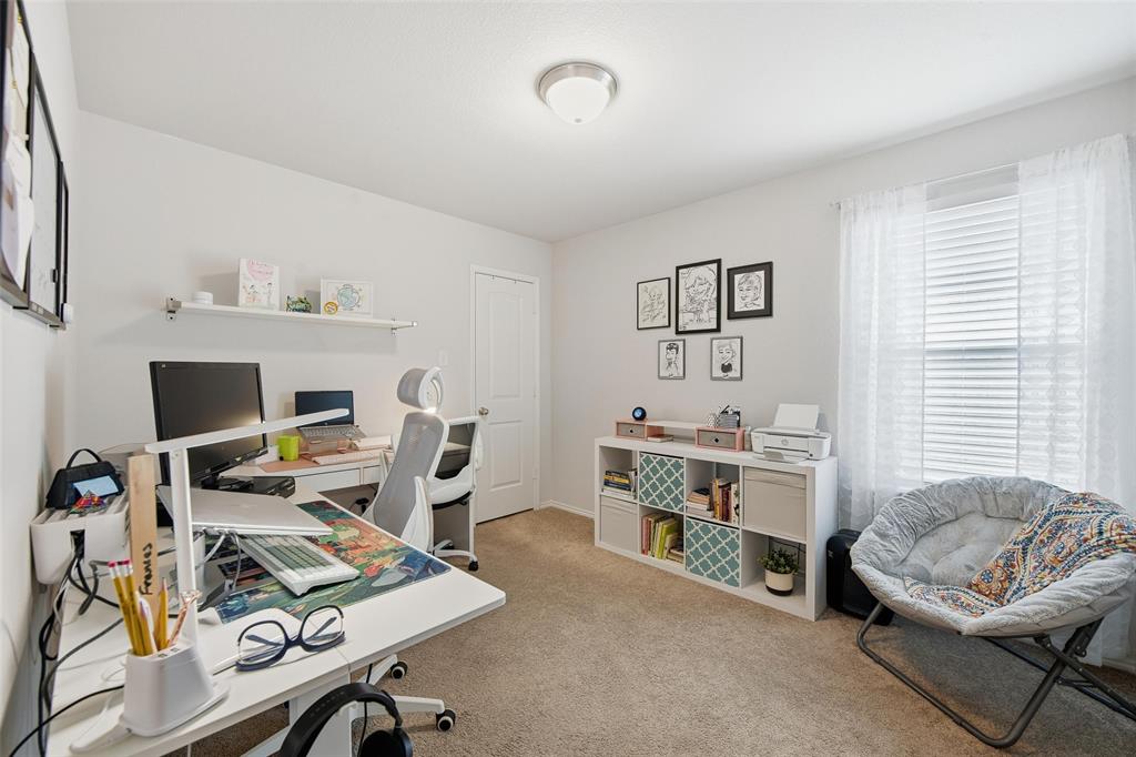 725 Sandy Chip Trail Fort Worth, TX 76108 - Photo 7 of 30 a view of a workspace with furniture and a window