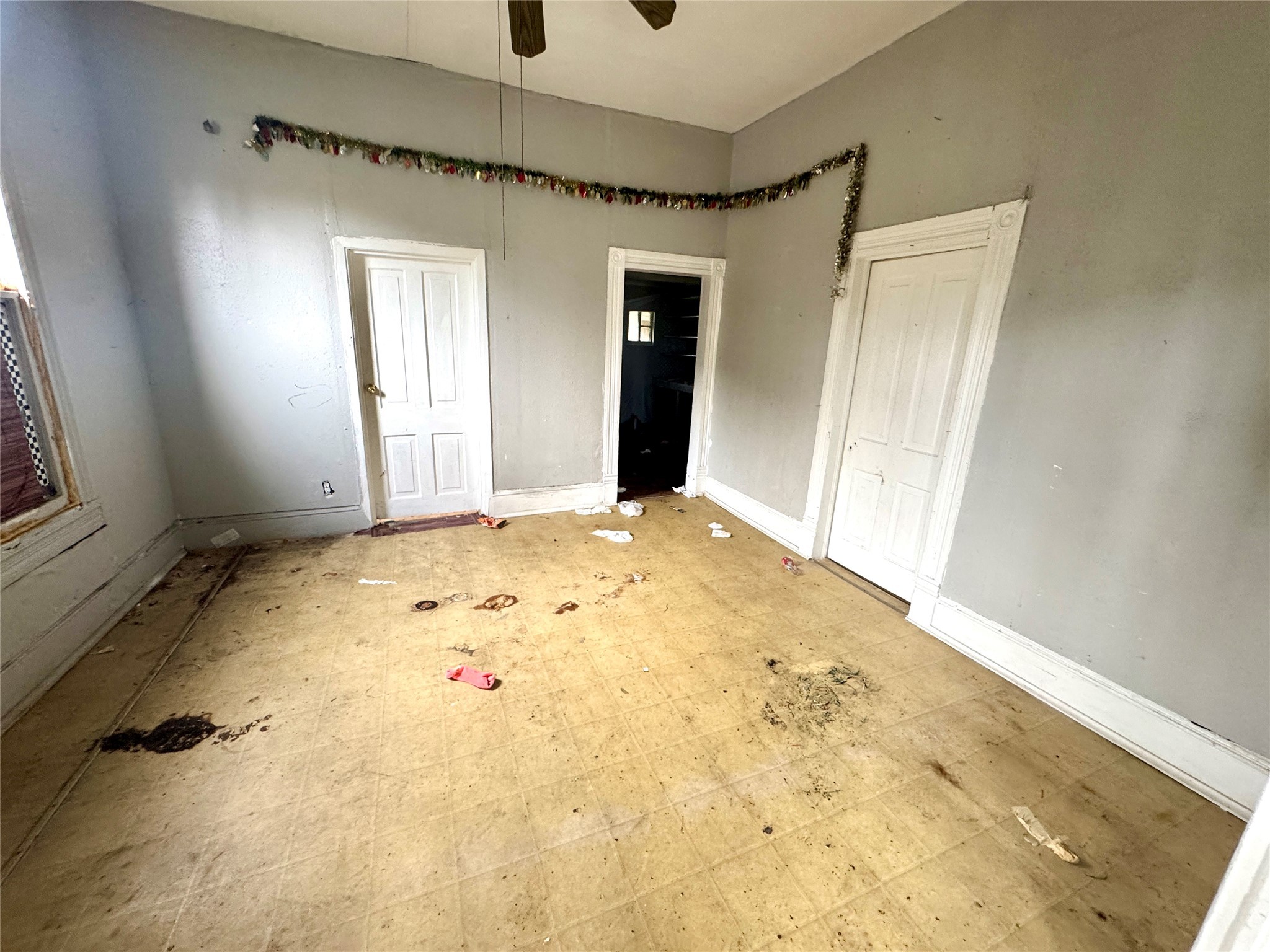 2809 Engelke Street Houston, TX 77003 - Photo 13 of 17 a view of a big room with wooden floor and cabinet in a room