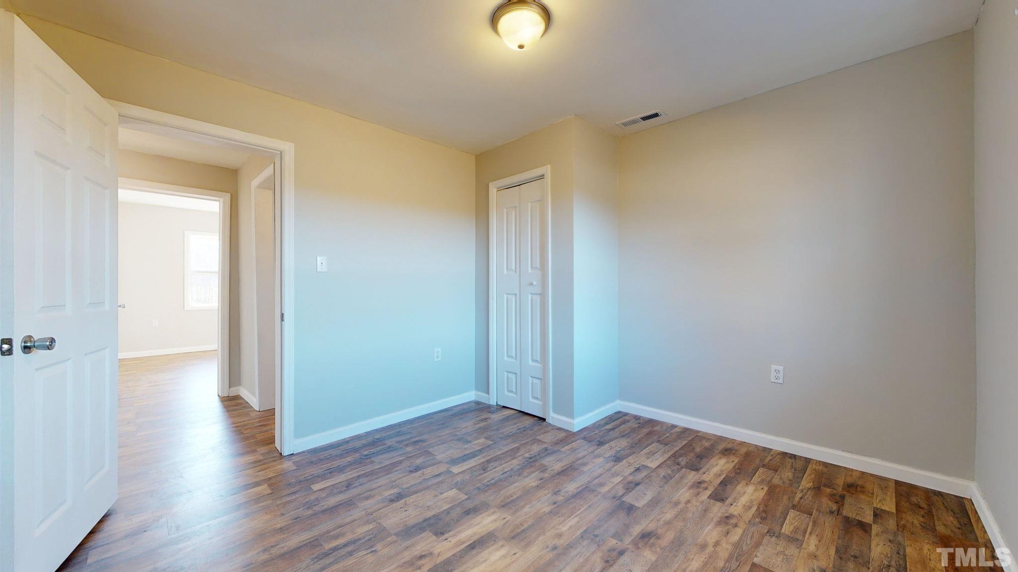 7646 Helena Moriah Road Rougemont, NC 27572 - Photo 22 of 37 wooden floor in an empty room