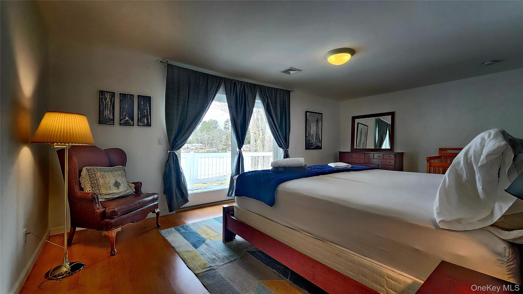 3437 State Rte 55 White Lake, NY 12786 - Photo 25 of 49 a bedroom with a bed and wooden floor