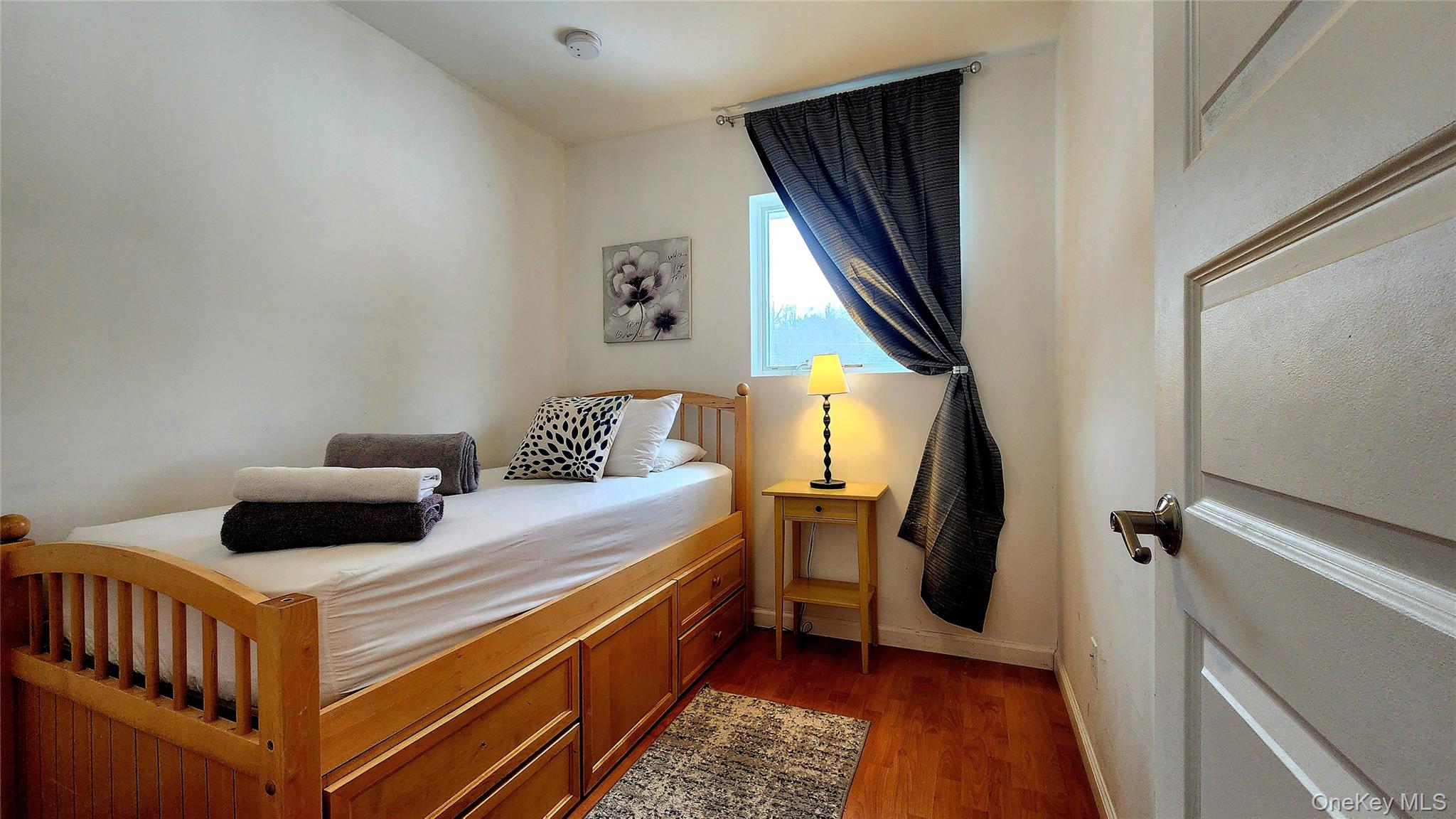 3437 State Rte 55 White Lake, NY 12786 - Photo 30 of 49 a bedroom with a bed and a window