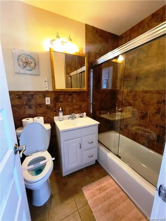 3437 State Rte 55 White Lake, NY 12786 - Photo 37 of 49 a bathroom with a sink a toilet and bathtub