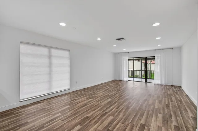 a view of livingroom with hardwood and hallway