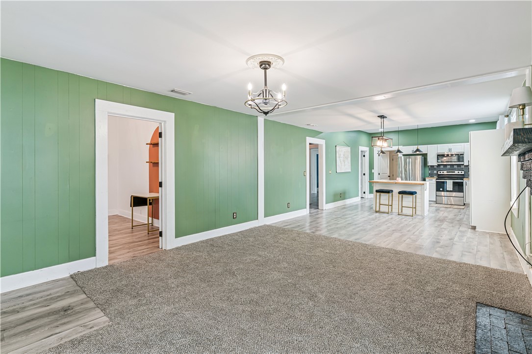 1009 K Street Brunswick, GA 31520 - Photo 3 of 23 Living Room features new carpet.