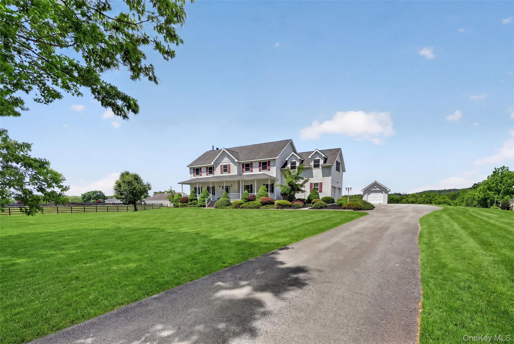 19 Bull Mine Road Chester, NY 10918 - Photo 3 of 42 Expansive property featuring a spacious front lawn, paved driveway, and detached garage structure