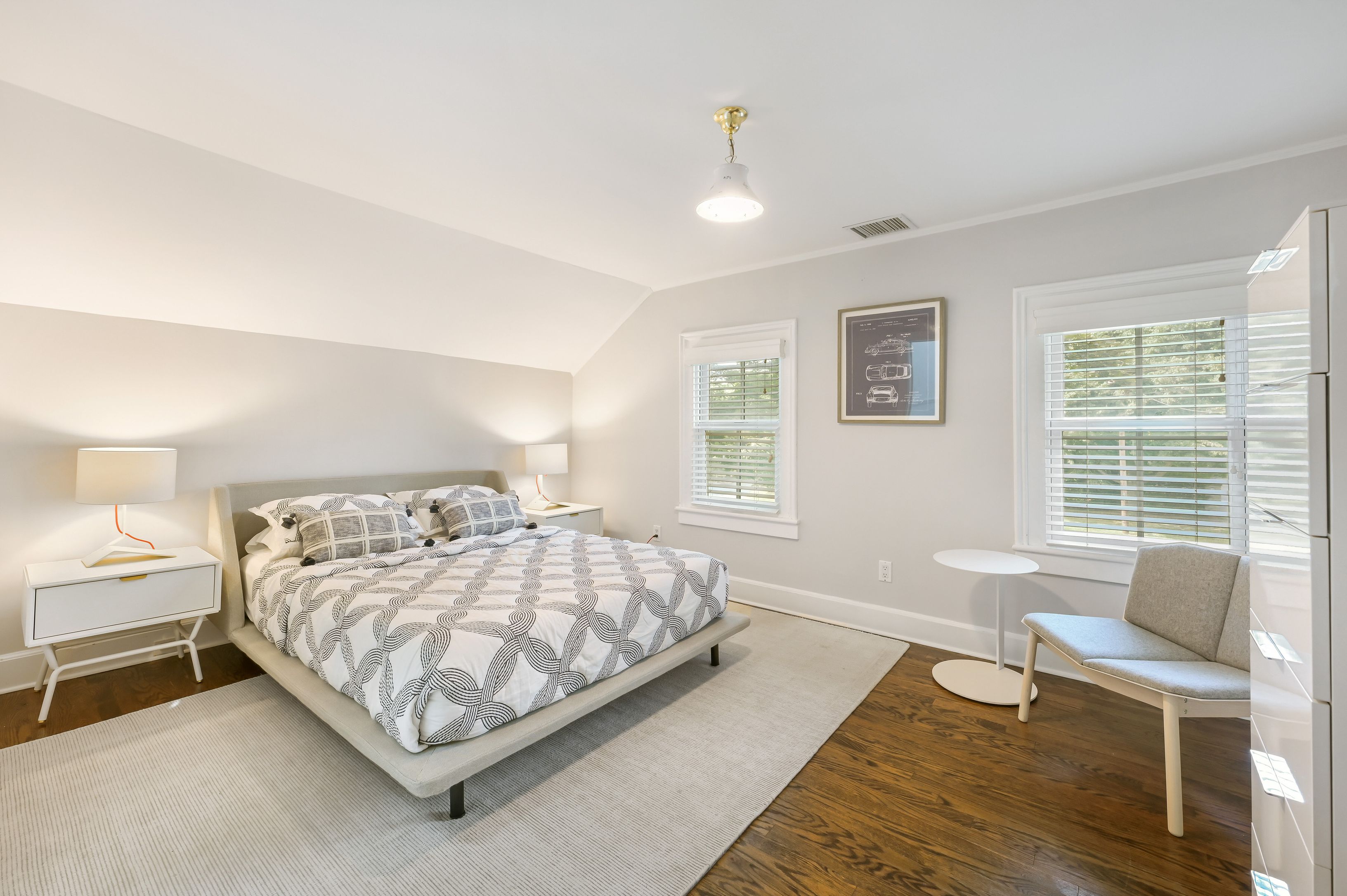 Undisclosed Address Southampton, NY 11968 - Photo 12 of 19 a bedroom with a bed and a couch