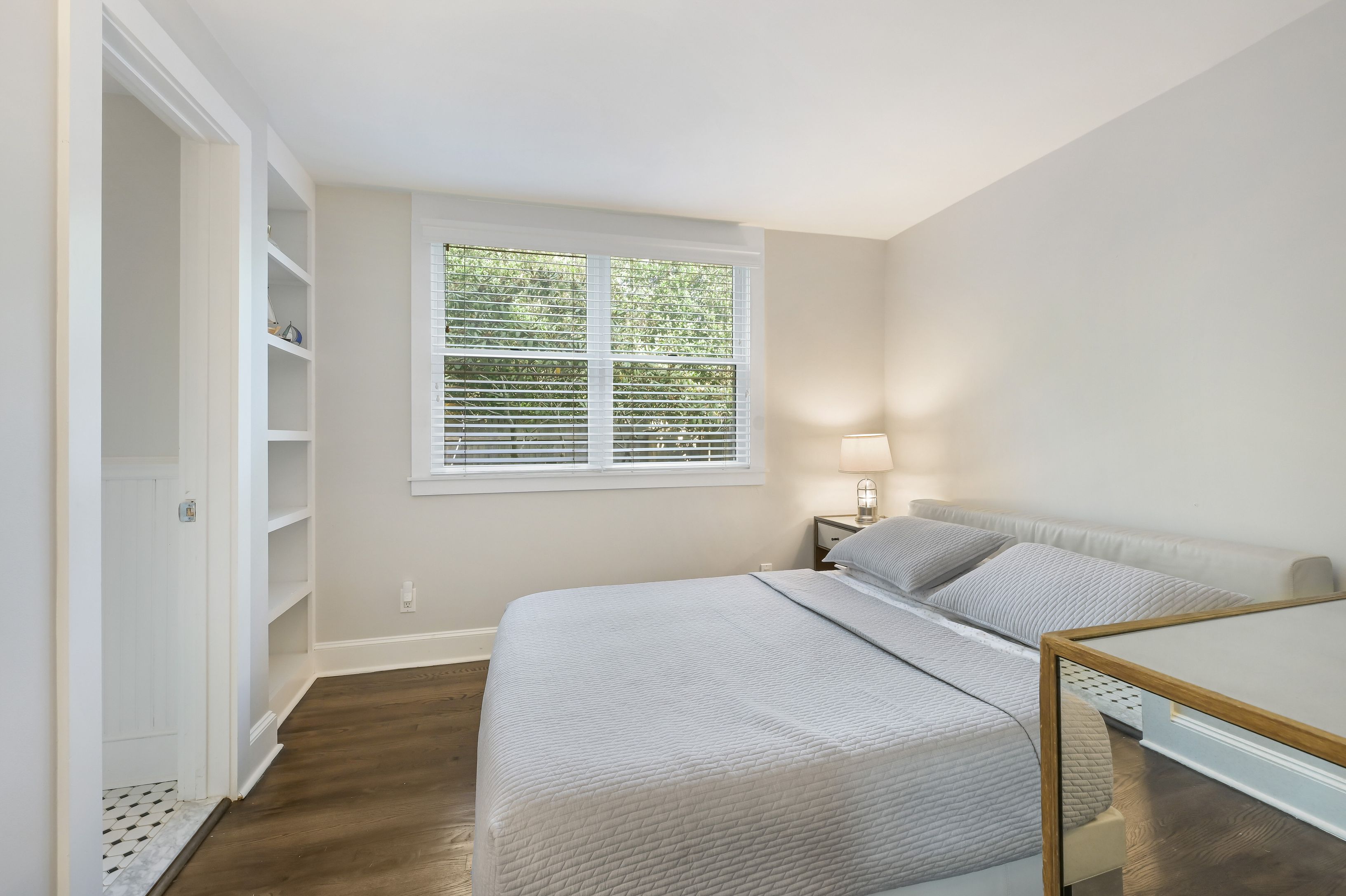Undisclosed Address Southampton, NY 11968 - Photo 14 of 19 a bedroom with a bed and a window