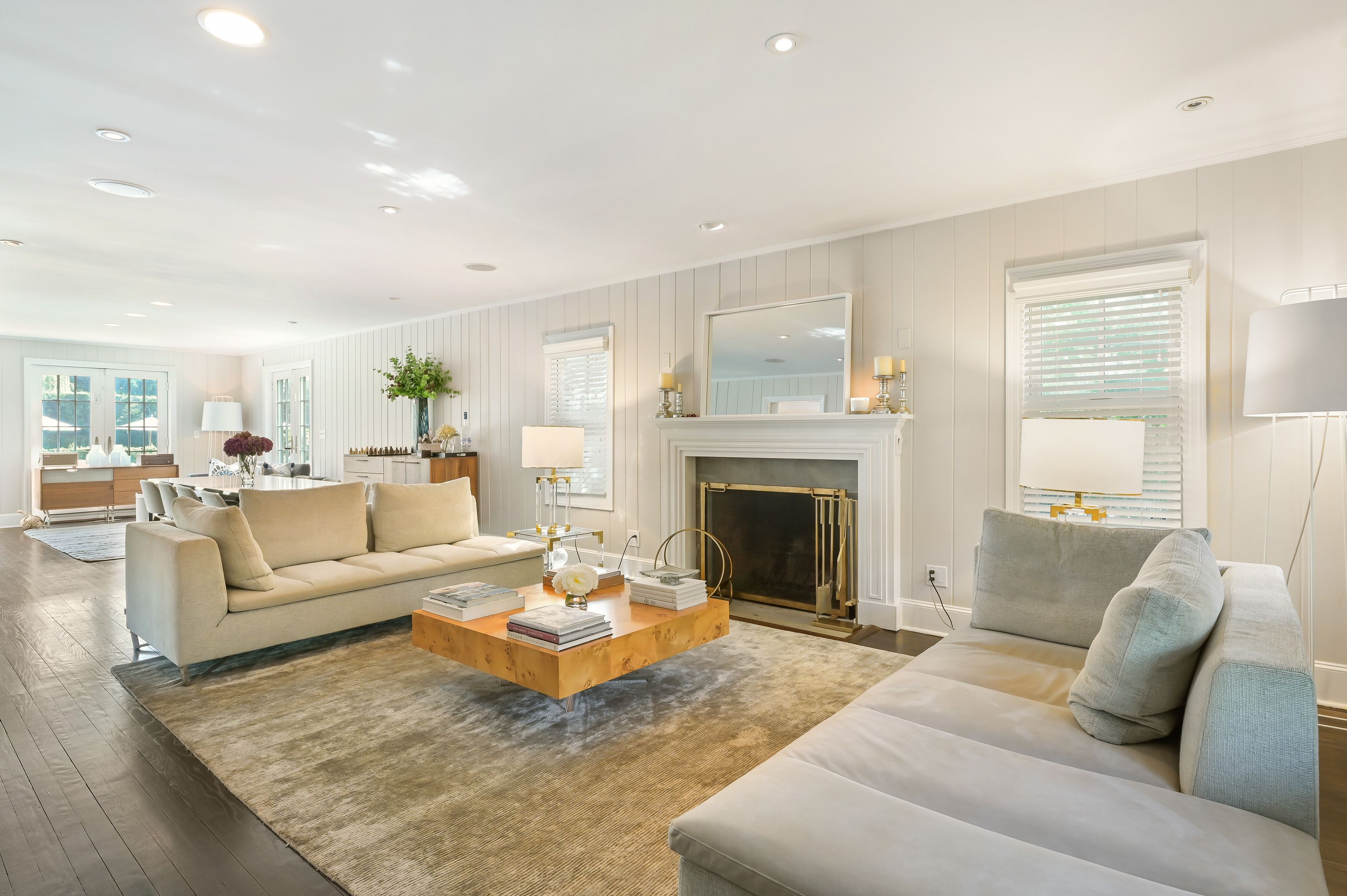 Undisclosed Address Southampton, NY 11968 - Photo 3 of 19 a living room with furniture and a fireplace