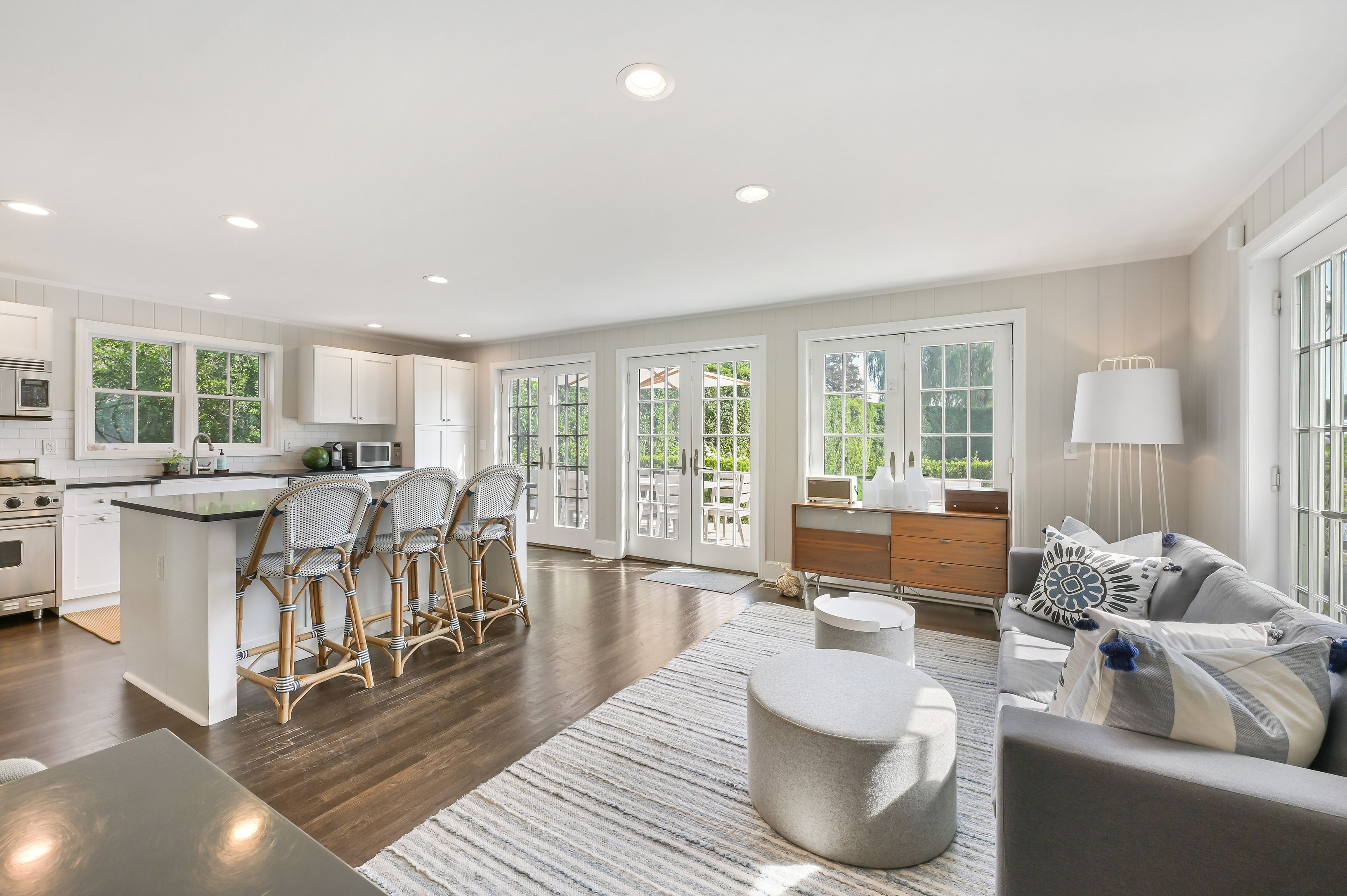 Undisclosed Address Southampton, NY 11968 - Photo 4 of 19 a living room with furniture and a large window