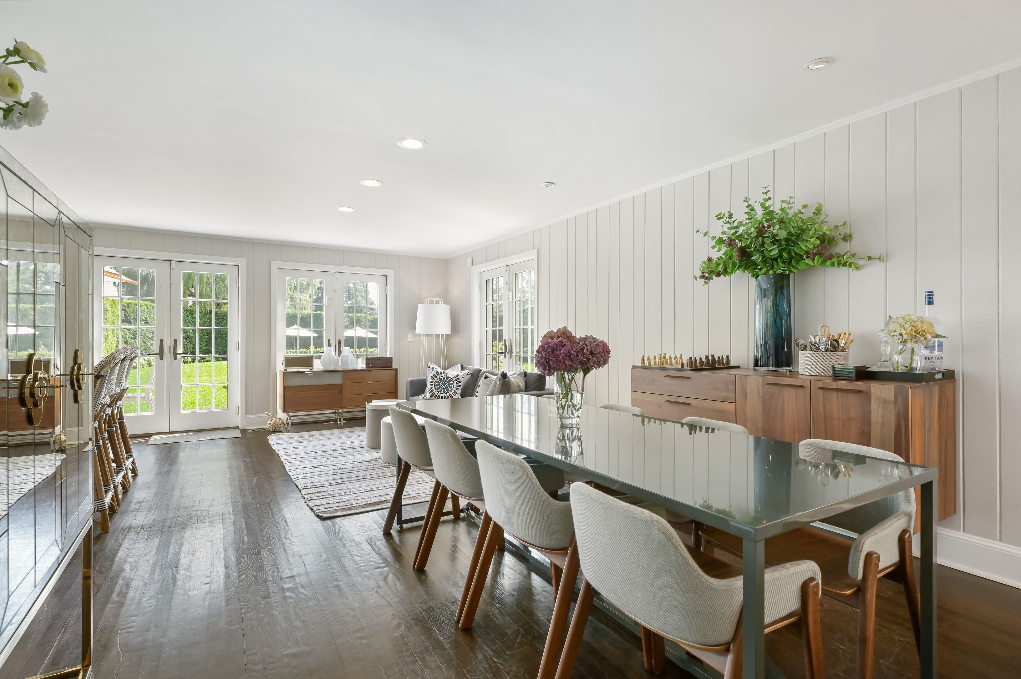 Undisclosed Address Southampton, NY 11968 - Photo 6 of 19 a view of a dining room with furniture and a potted plant