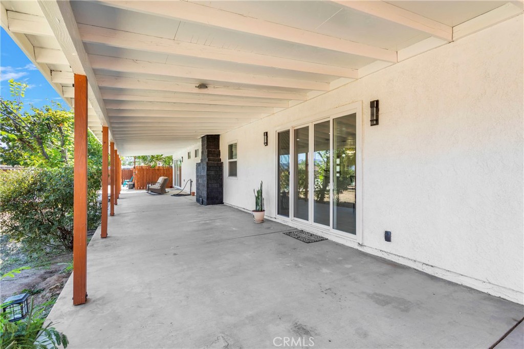 8263 3rd Avenue Hesperia, CA 92345 - Photo 39 of 56 a view of a room with balcony and furniture