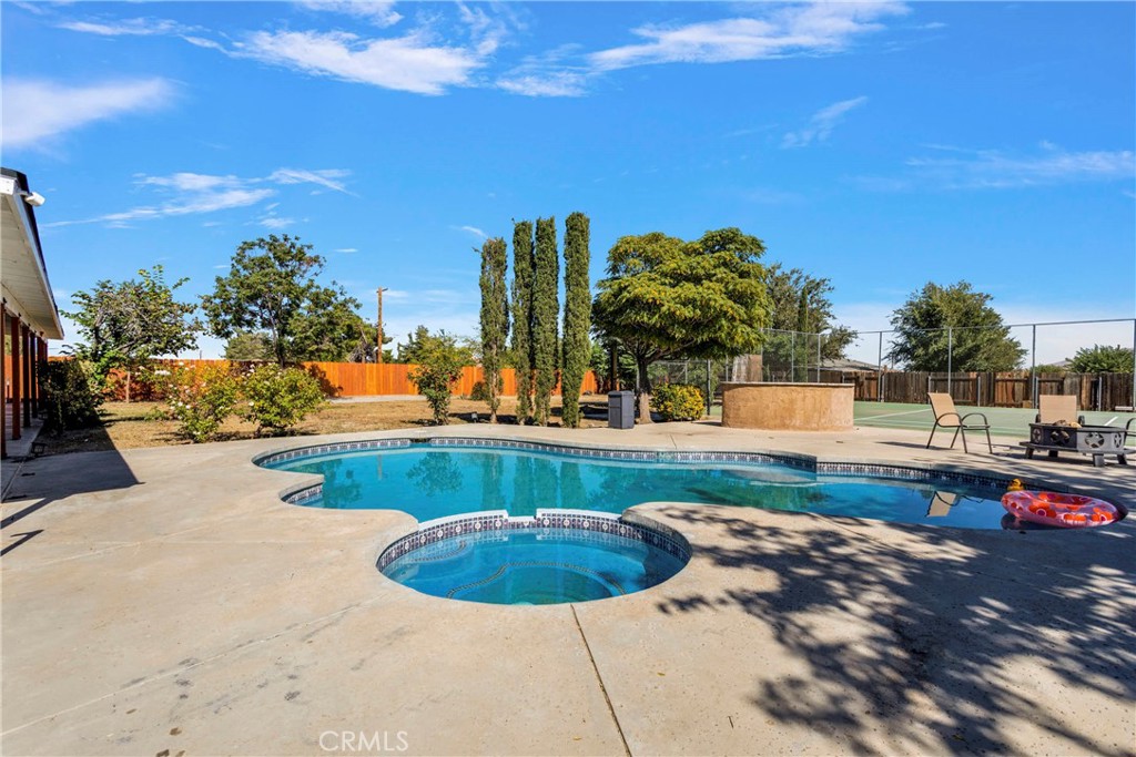 8263 3rd Avenue Hesperia, CA 92345 - Photo 40 of 56 a view of a swimming pool