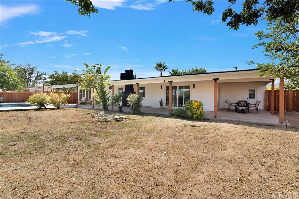 8263 3rd Avenue Hesperia, CA 92345 - Photo 50 of 56 a view of a house with a patio