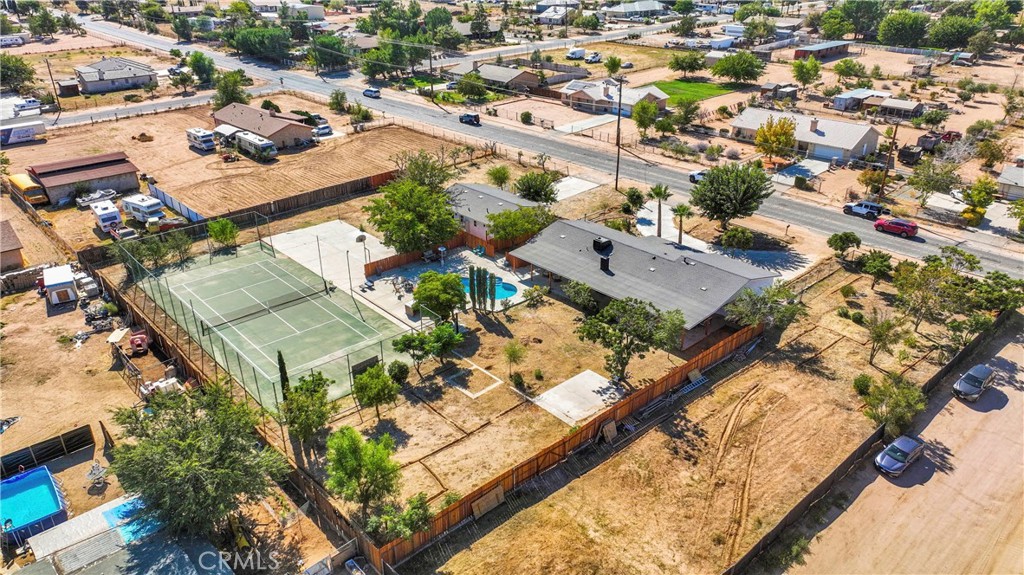 8263 3rd Avenue Hesperia, CA 92345 - Photo 52 of 56 an aerial view of residential houses with outdoor space
