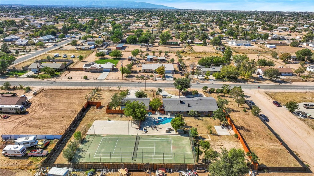 8263 3rd Avenue Hesperia, CA 92345 - Photo 53 of 56 an aerial view of residential houses with outdoor space