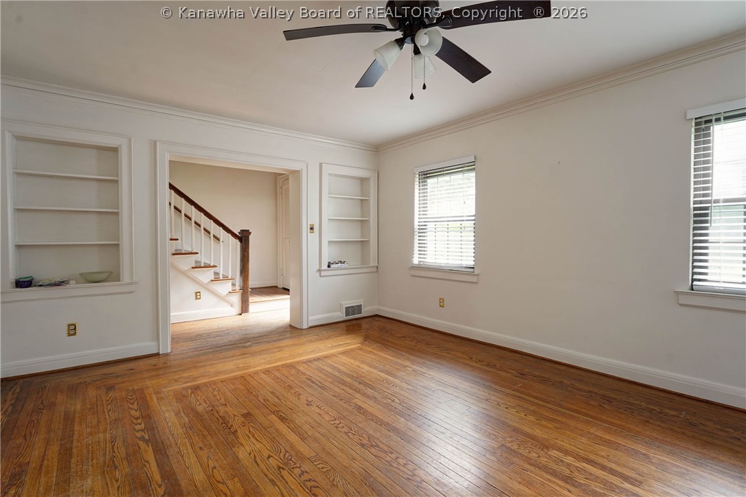707 Laurel Road Charleston, WV 25314 - Photo 3 of 30 Main floor living room w/ built in bookcases.