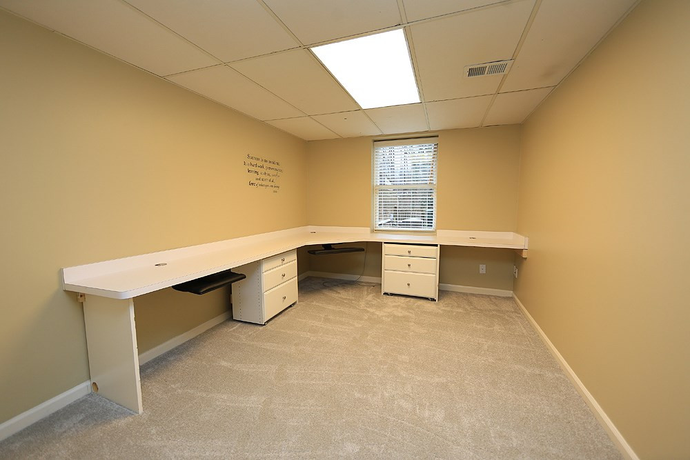 2810 Wycliff Road Raleigh, NC 27607 - Photo 12 of 15 Bedroom or Office ? You Decide. Currently Former Office with Custom Counter Tops and 2 Custom Built Drawer Stacks on Wheels. Plus 2 Ergonomic Keyboard Trays by Workrite Ergonomics. Bedroom #4 or Office