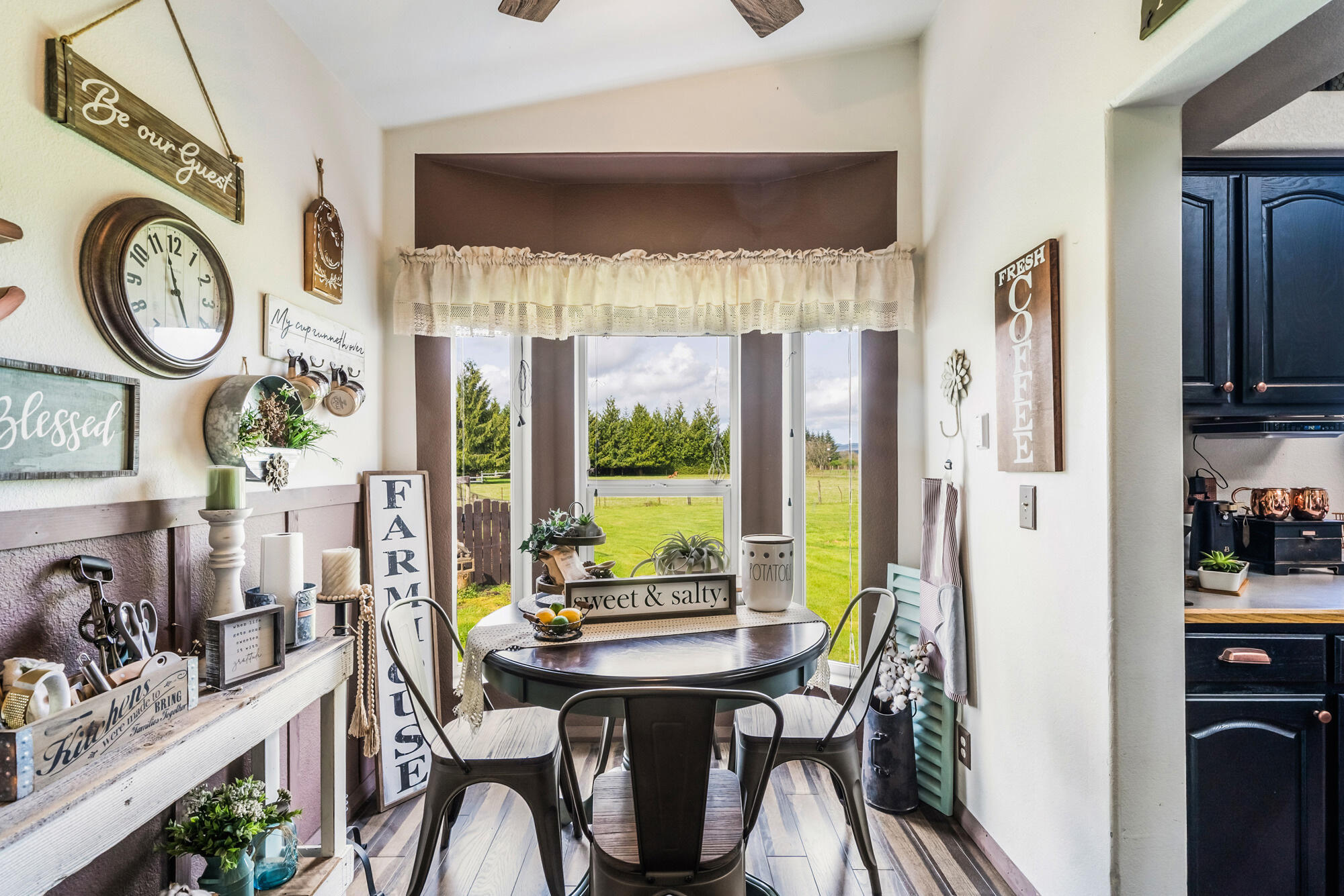 7400 South Prairie Road Tillamook, OR 97141 - Photo 15 of 62 a view of a dining room with furniture window and outside view